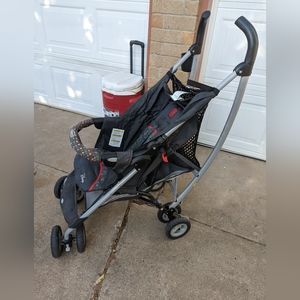 Easy to set up and store, size child stroller Mickey Mouse design. Has canopy